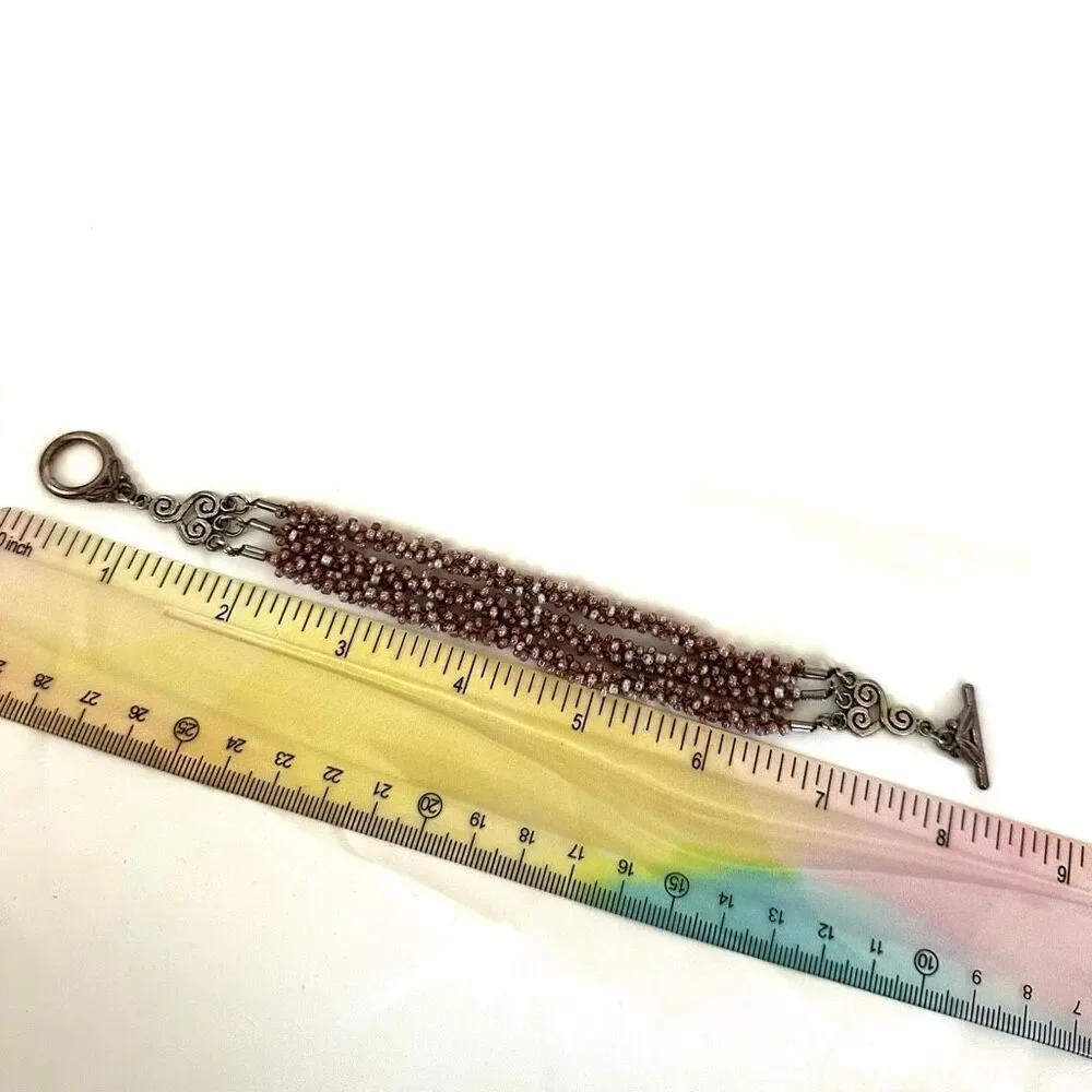 Triple strand seed beaded bracelet
